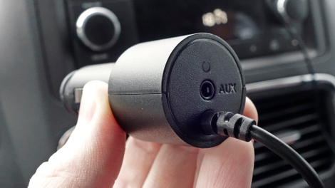 The Speak’s cigarette lighter adapter includes an AUX-out jack for routing audio through an older car’s sound system.